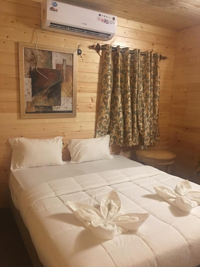 Tiara Fiesta Beach Cottages Morjim Bagian luar foto